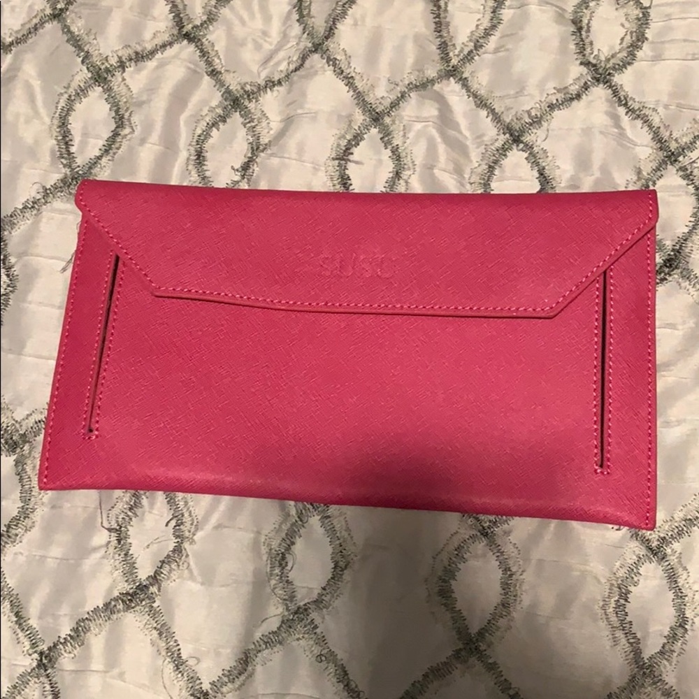 Hot pink clutch